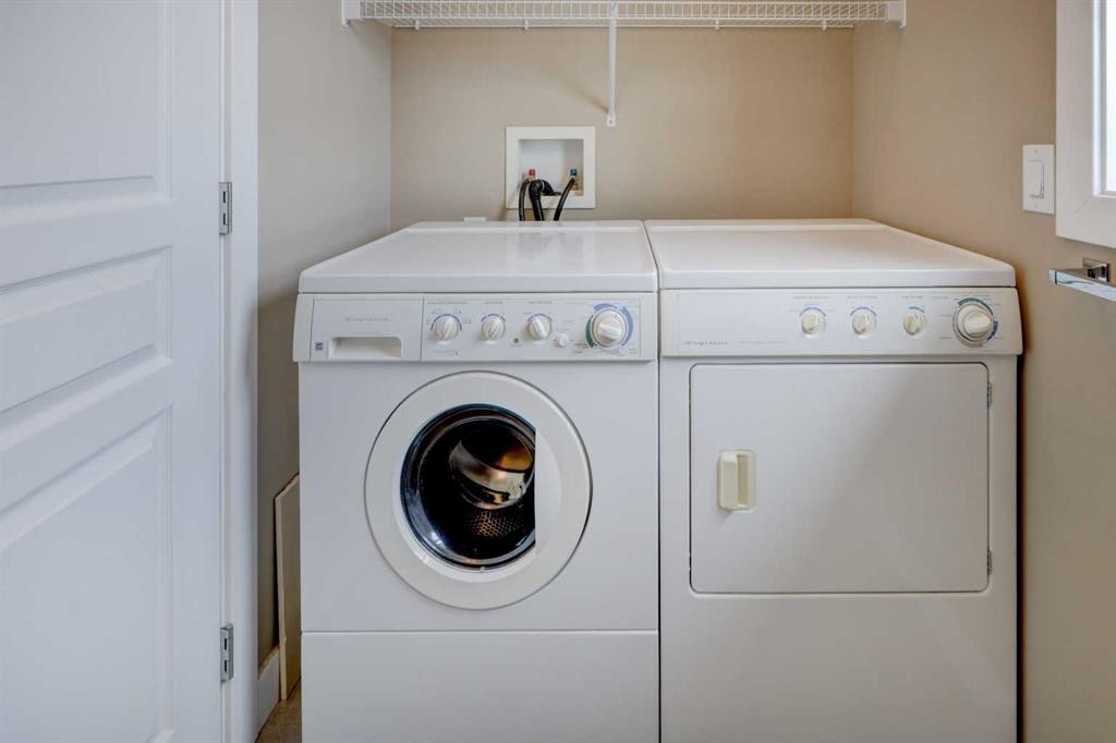 147 Panatella Hill, Calgary, AB - Indoor Photo Showing Laundry Room