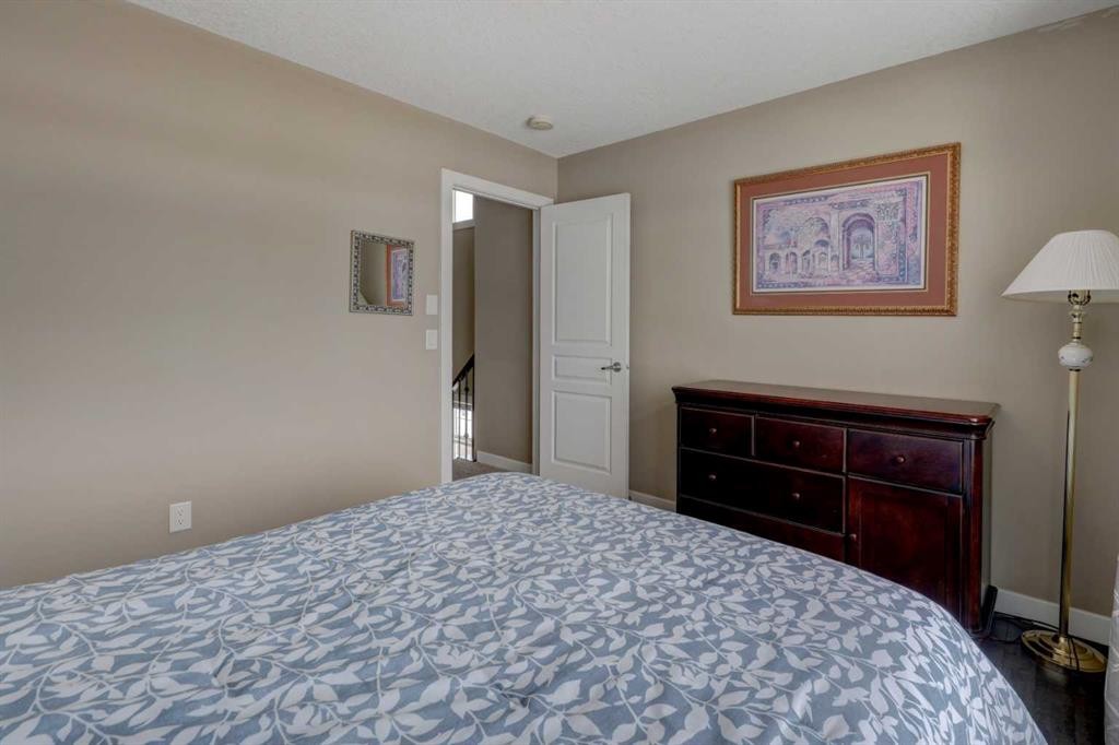 147 Panatella Hill, Calgary, AB - Indoor Photo Showing Bedroom