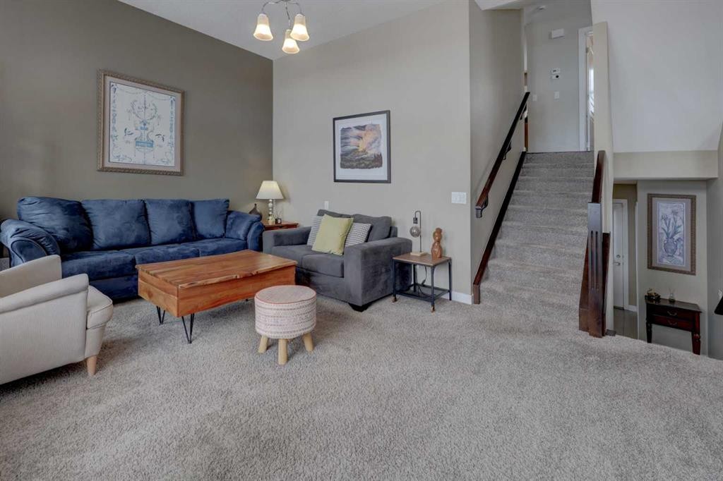 147 Panatella Hill, Calgary, AB - Indoor Photo Showing Living Room