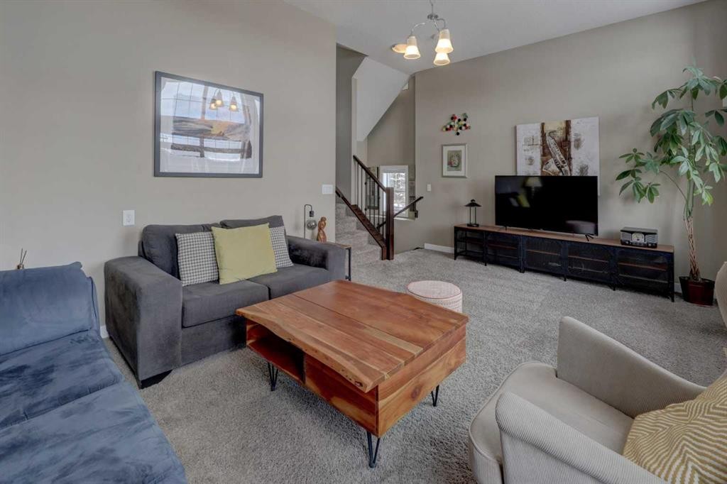 147 Panatella Hill, Calgary, AB - Indoor Photo Showing Living Room