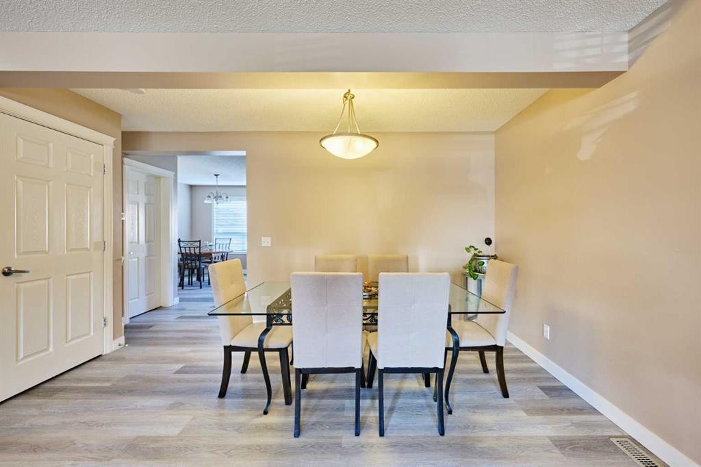 188 Silverado Plains Close Sw, Calgary, AB - Indoor Photo Showing Dining Room