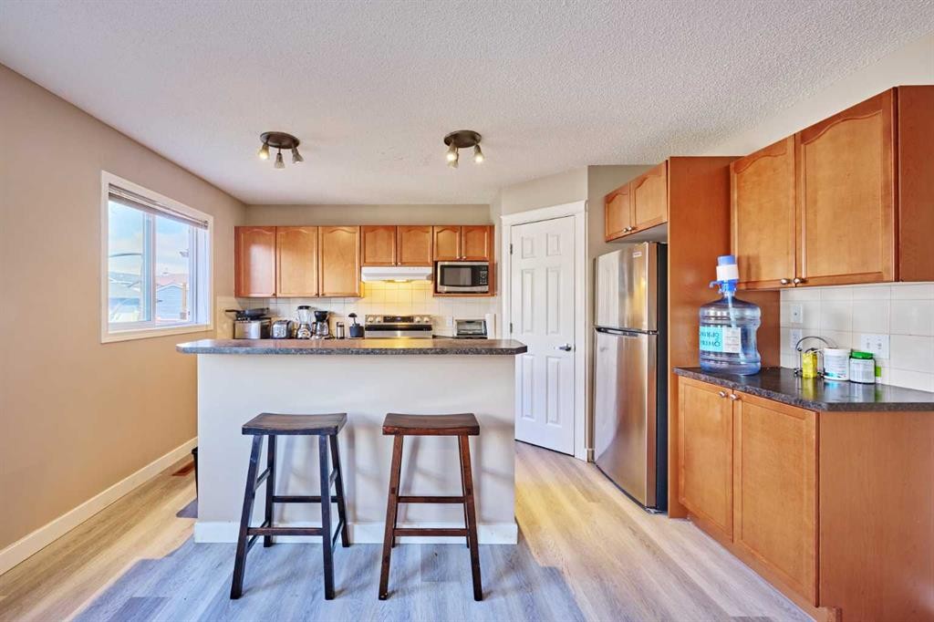 188 Silverado Plains Close Sw, Calgary, AB - Indoor Photo Showing Kitchen
