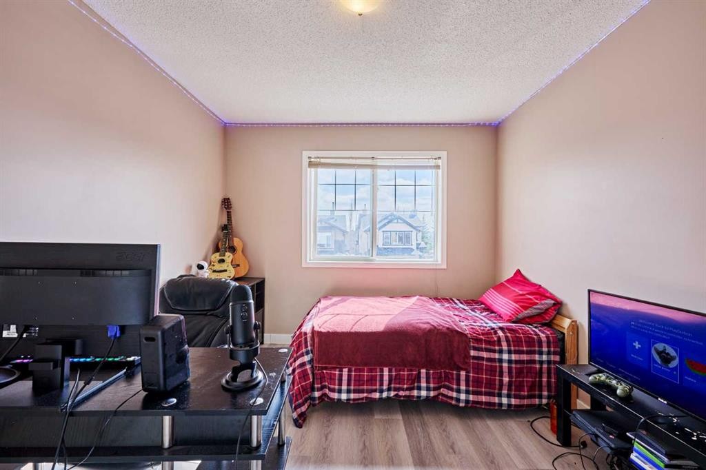 188 Silverado Plains Close Sw, Calgary, AB - Indoor Photo Showing Bedroom