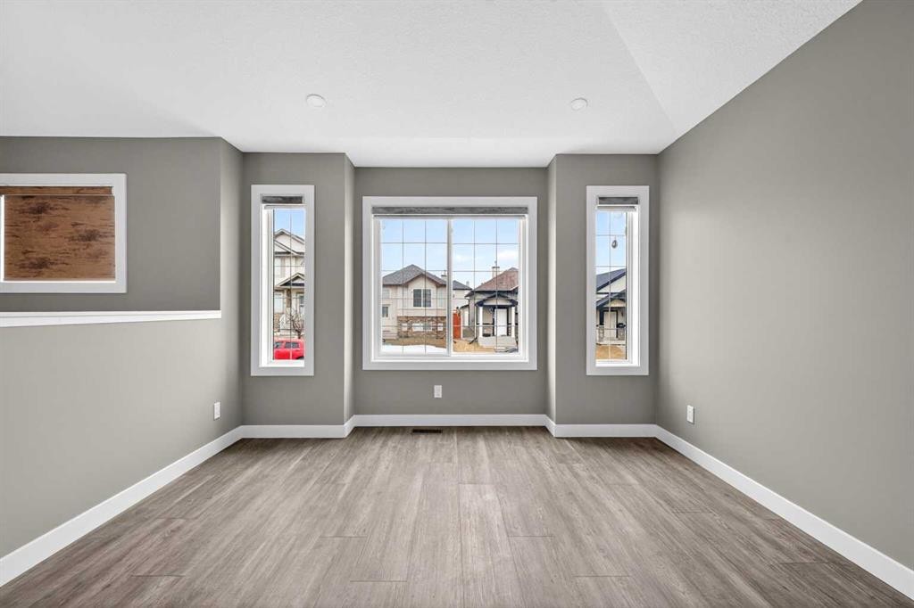 125 Saddlefield Crescent Ne, Calgary, AB - Indoor Photo Showing Living Room With Fireplace