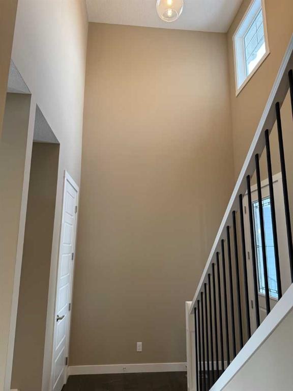 115 Sundown Crescent, Cochrane, AB - Indoor Photo Showing Other Room