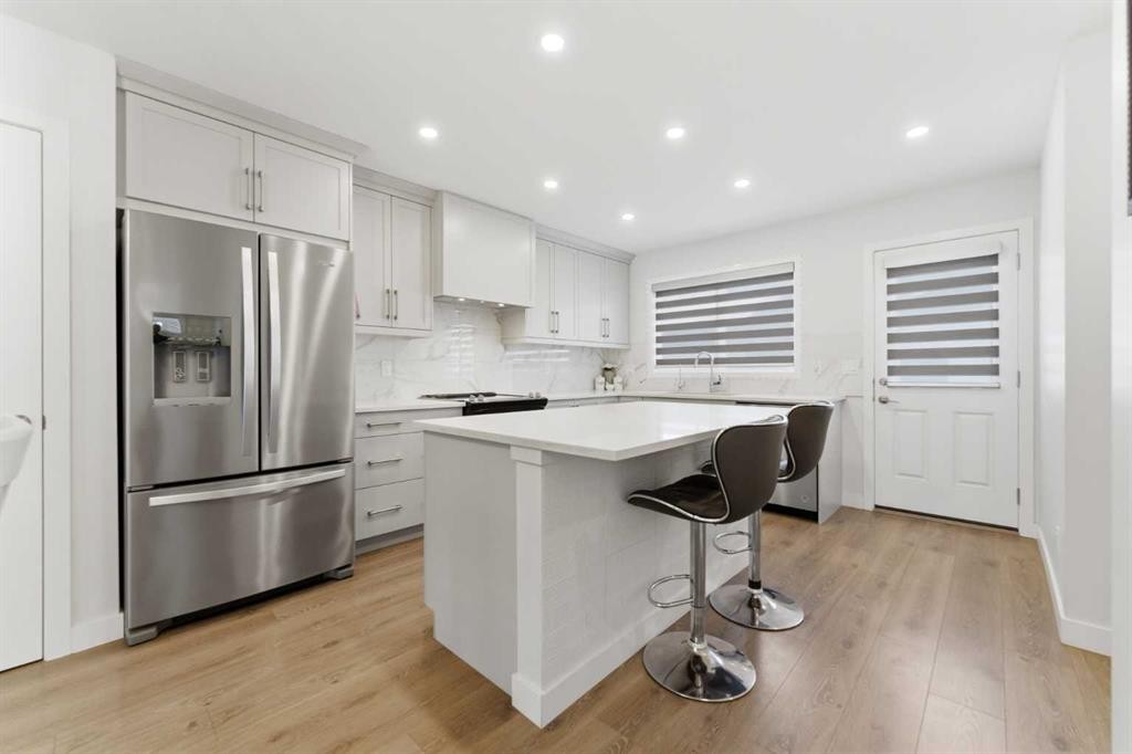 99 Aquila Way Nw, Calgary, AB - Indoor Photo Showing Kitchen With Upgraded Kitchen