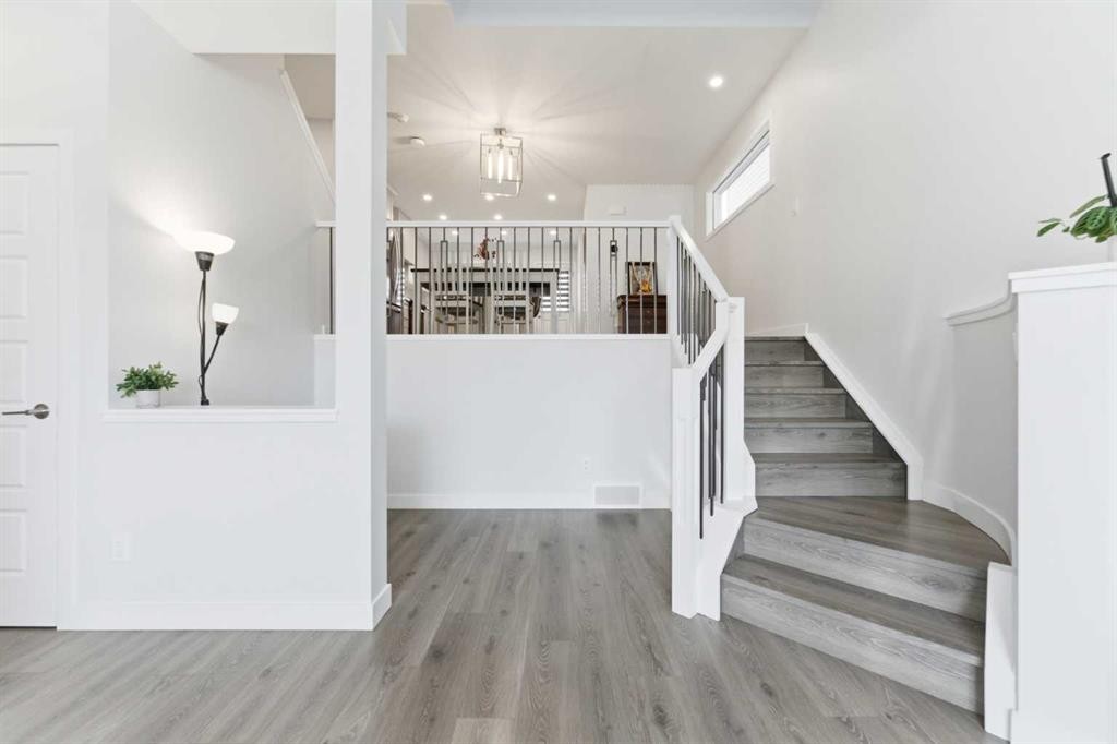 99 Aquila Way Nw, Calgary, AB - Indoor Photo Showing Other Room