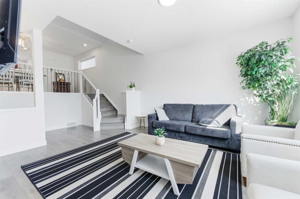 99 Aquila Way Nw, Calgary, AB - Indoor Photo Showing Other Room