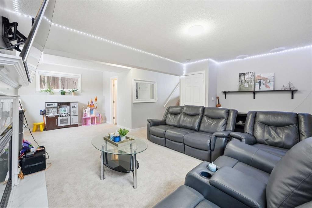 151 Templevale Place Ne, Calgary, AB - Indoor Photo Showing Living Room
