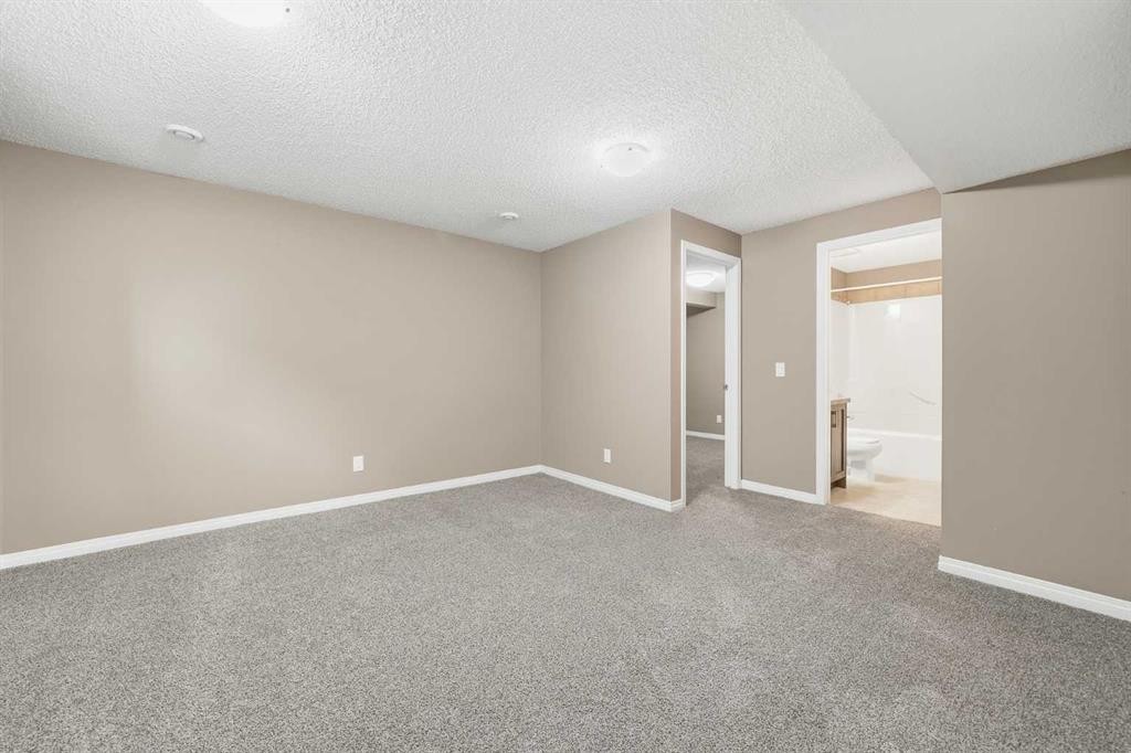 83 Cranfield Crescent Se, Calgary, AB - Indoor Photo Showing Other Room