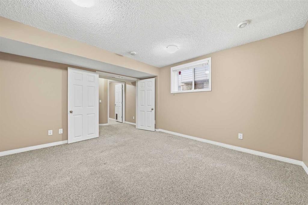 83 Cranfield Crescent Se, Calgary, AB - Indoor Photo Showing Other Room