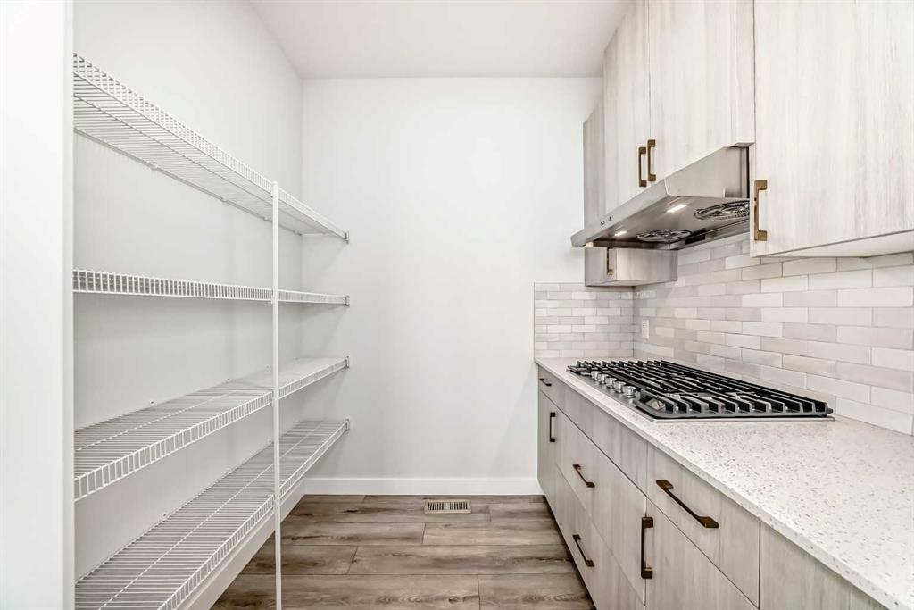 100 Corner Glen Manor Ne, Calgary, AB - Indoor With Storage