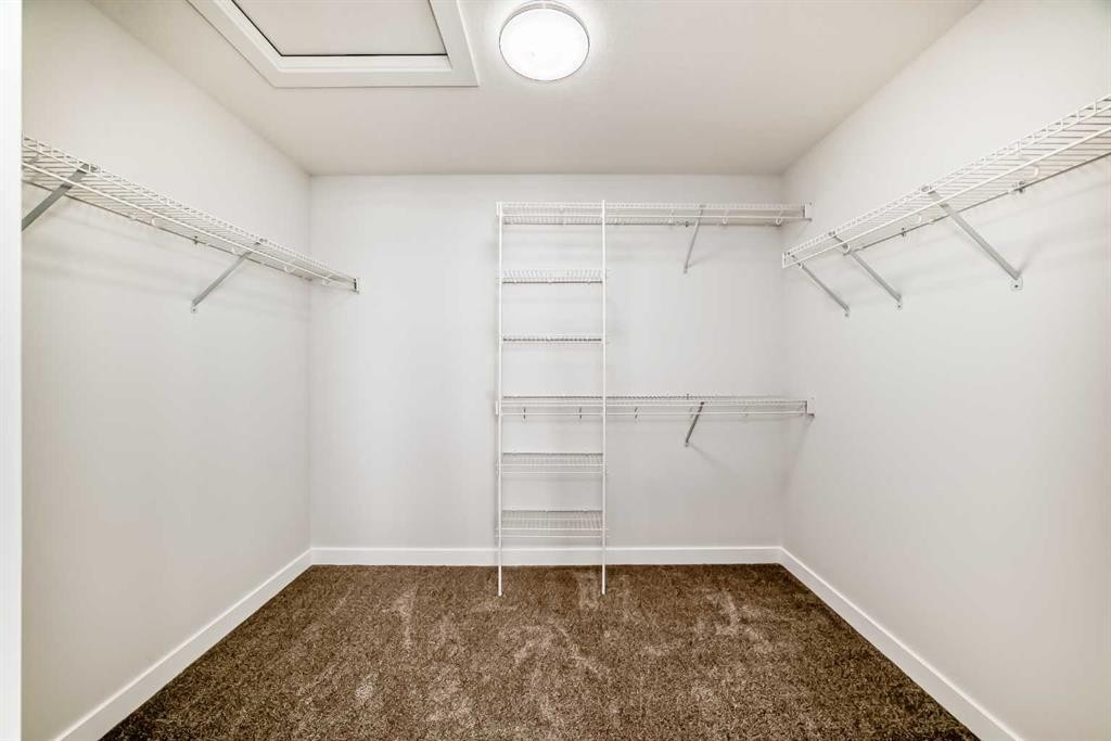 100 Corner Glen Manor Ne, Calgary, AB - Indoor With Storage