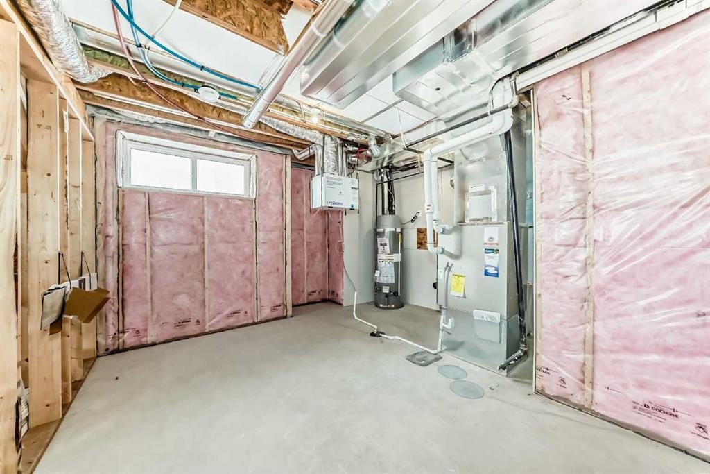 100 Corner Glen Manor Ne, Calgary, AB - Indoor Photo Showing Basement