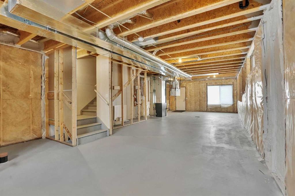26 Amblehurst Path Nw, Calgary, AB - Indoor Photo Showing Basement