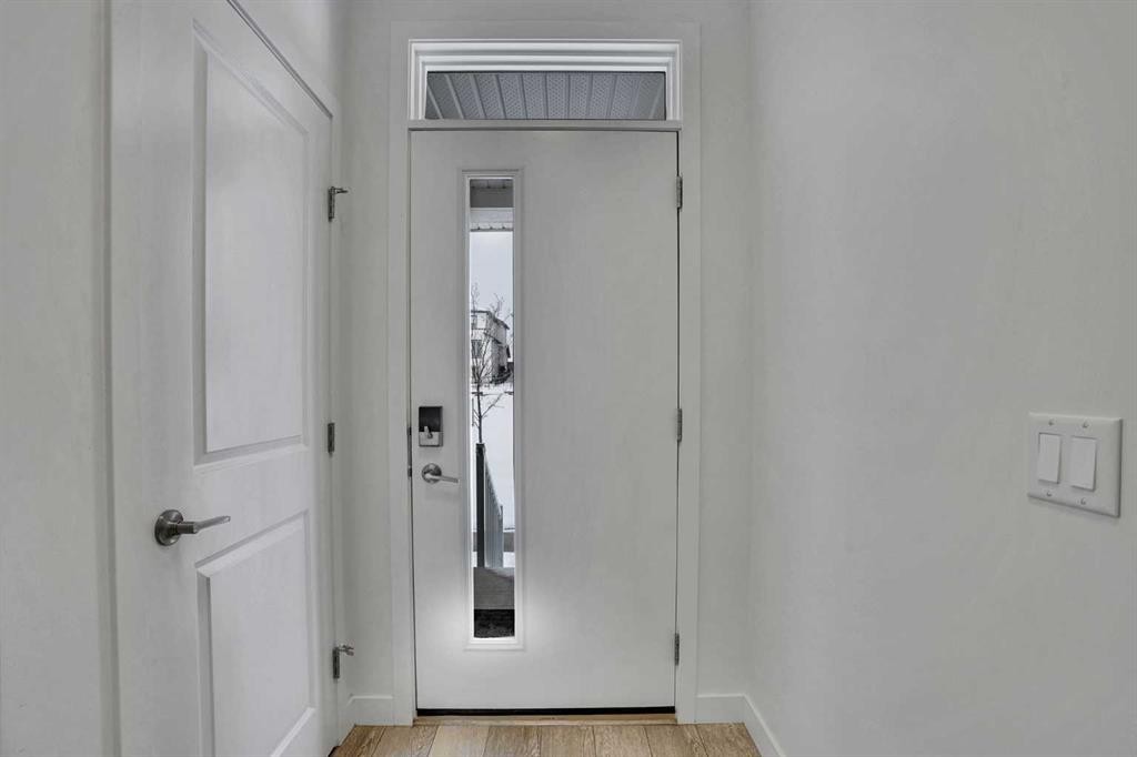 26 Amblehurst Path Nw, Calgary, AB - Indoor Photo Showing Other Room
