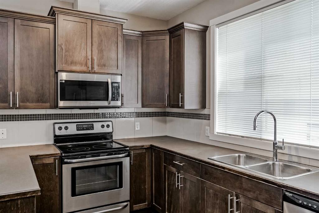 108 Redstone View Ne, Calgary, AB - Indoor Photo Showing Kitchen With Stainless Steel Kitchen With Double Sink