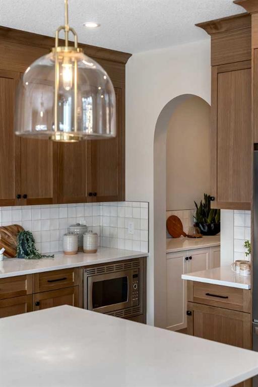 47 Sundown Crescent, Cochrane, AB - Indoor Photo Showing Kitchen