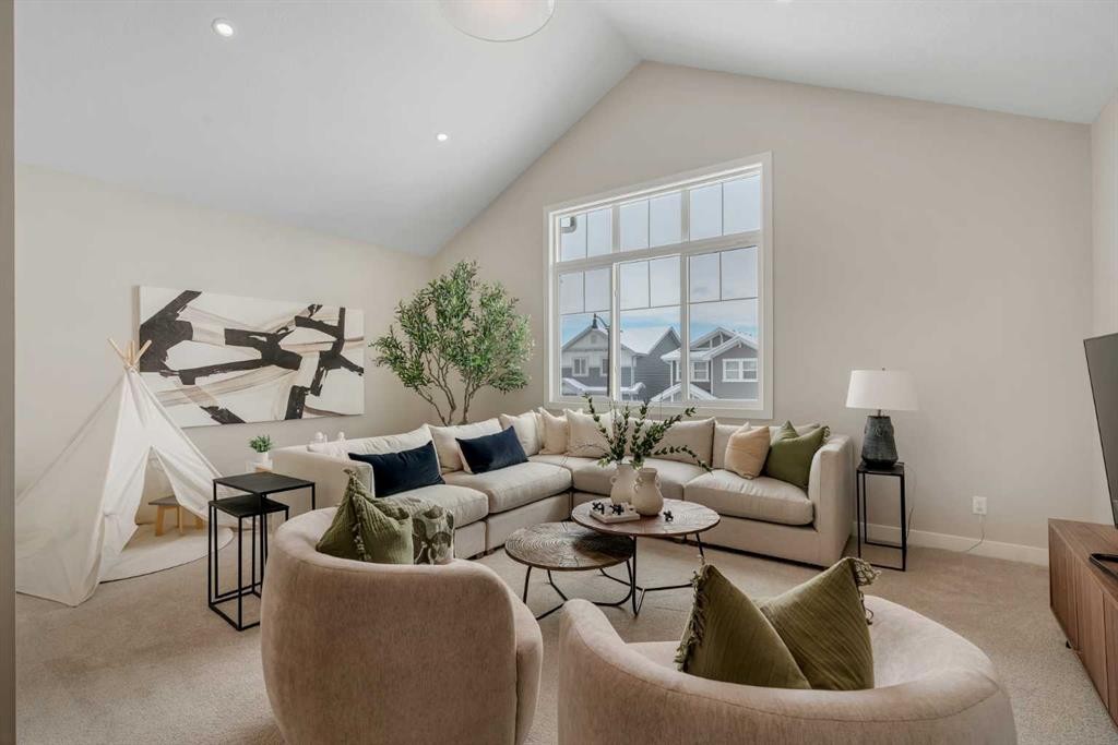 47 Sundown Crescent, Cochrane, AB - Indoor Photo Showing Living Room