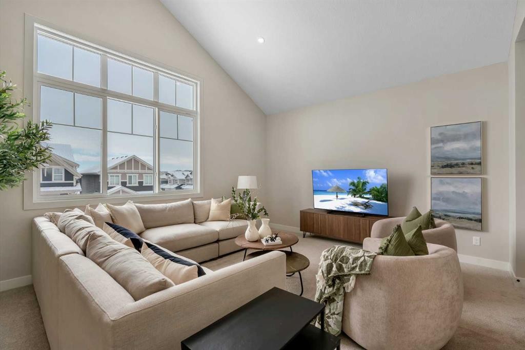47 Sundown Crescent, Cochrane, AB - Indoor Photo Showing Living Room