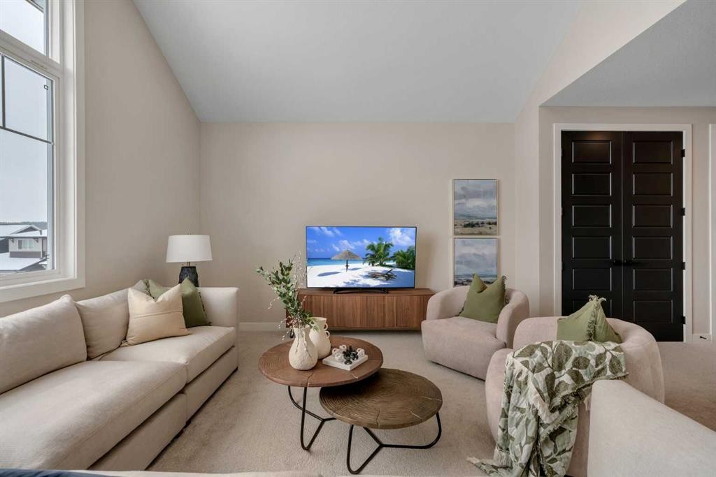 47 Sundown Crescent, Cochrane, AB - Indoor Photo Showing Living Room