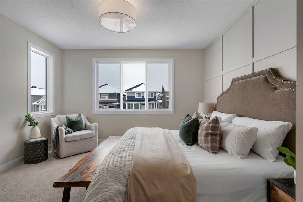 47 Sundown Crescent, Cochrane, AB - Indoor Photo Showing Bedroom