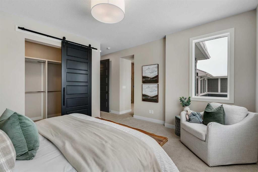 47 Sundown Crescent, Cochrane, AB - Indoor Photo Showing Bedroom