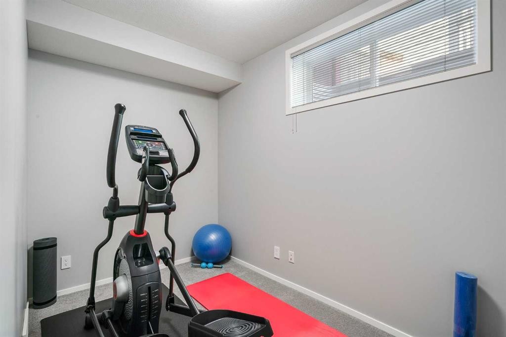 288 Copperstone Gardens Se, Calgary, AB - Indoor Photo Showing Gym Room