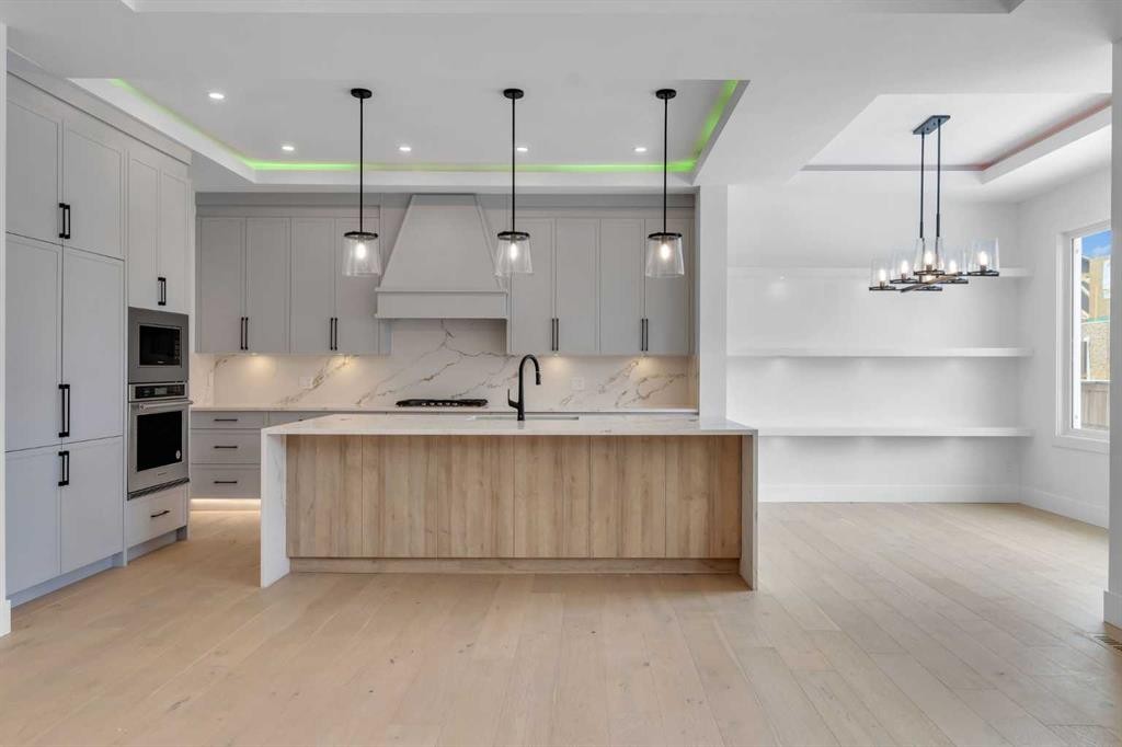 223 Kinniburgh Loop, Chestermere, AB - Indoor Photo Showing Kitchen With Upgraded Kitchen