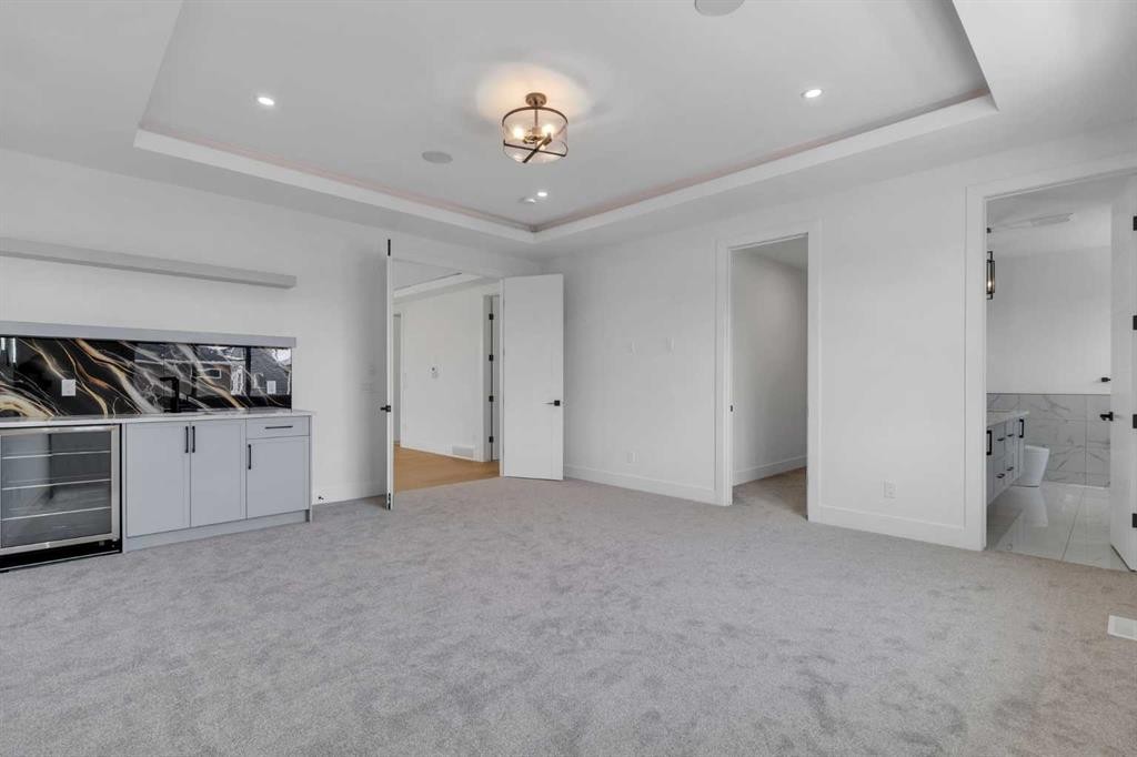 223 Kinniburgh Loop, Chestermere, AB - Indoor Photo Showing Other Room