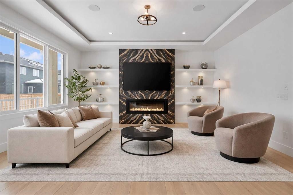 223 Kinniburgh Loop, Chestermere, AB - Indoor Photo Showing Living Room