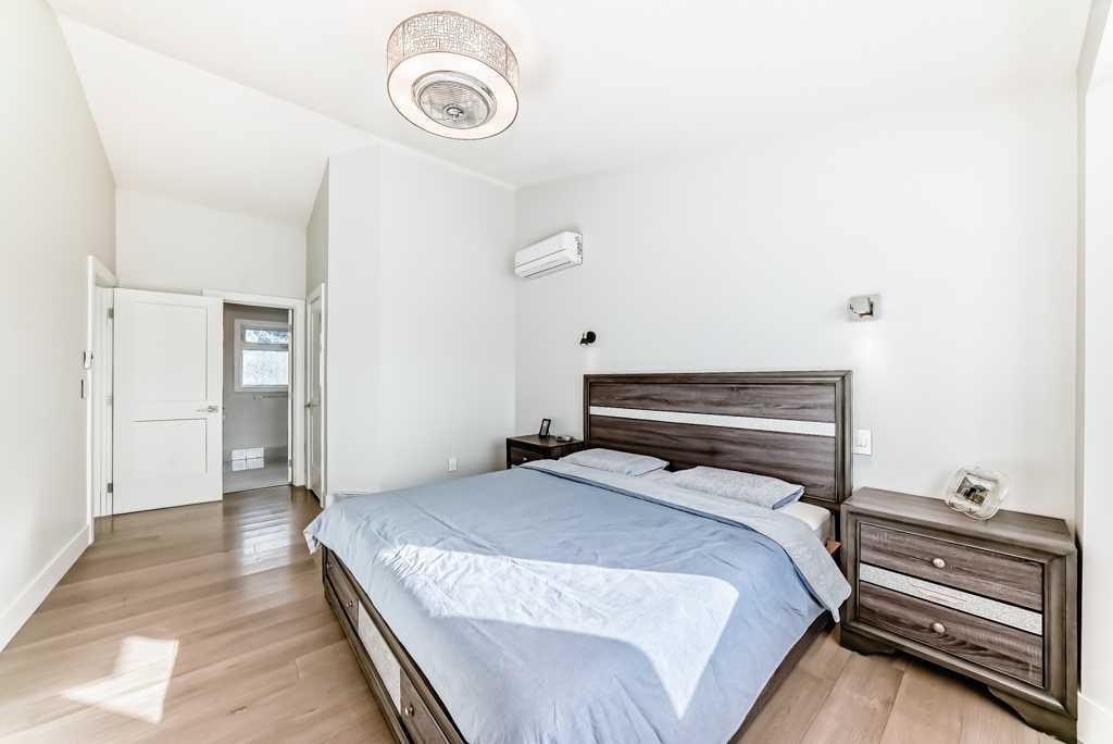 256 Riverside Mews Se, Calgary, AB - Indoor Photo Showing Bedroom