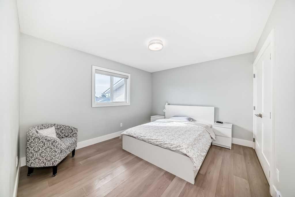 256 Riverside Mews Se, Calgary, AB - Indoor Photo Showing Bedroom