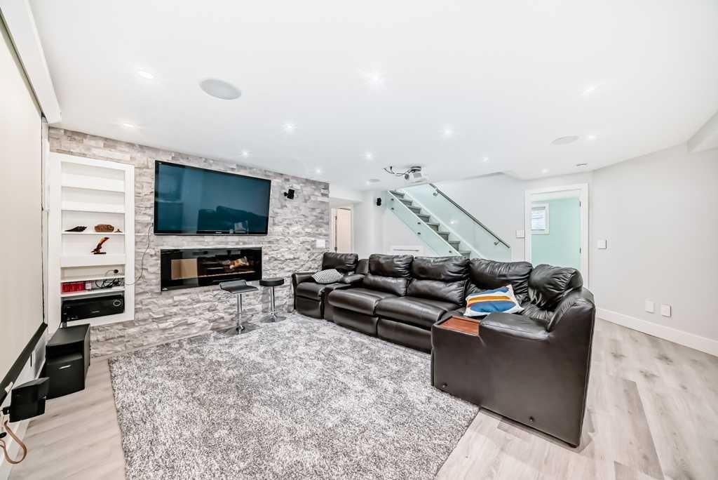 256 Riverside Mews Se, Calgary, AB - Indoor Photo Showing Living Room