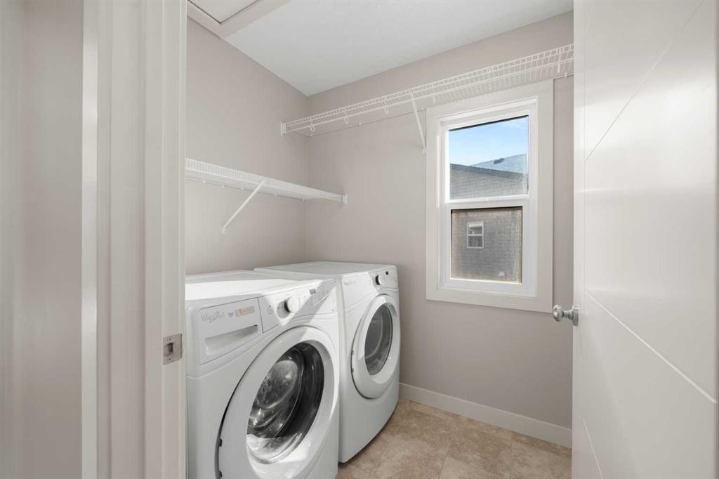 151 Heritage View, Cochrane, AB - Indoor Photo Showing Laundry Room