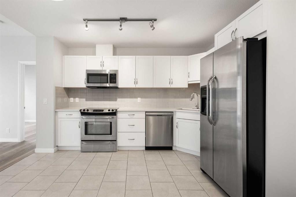 1903-1320 1 Street Se, Calgary, AB - Indoor Photo Showing Kitchen With Stainless Steel Kitchen