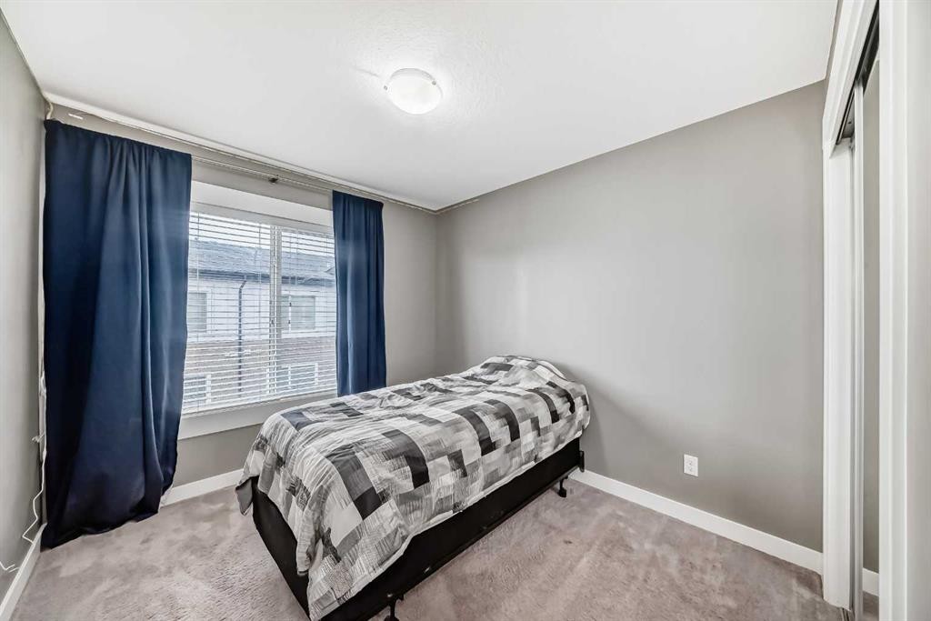 53-111 Rainbow Falls, Chestermere, AB - Indoor Photo Showing Bedroom