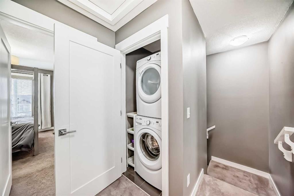 53-111 Rainbow Falls, Chestermere, AB - Indoor Photo Showing Laundry Room