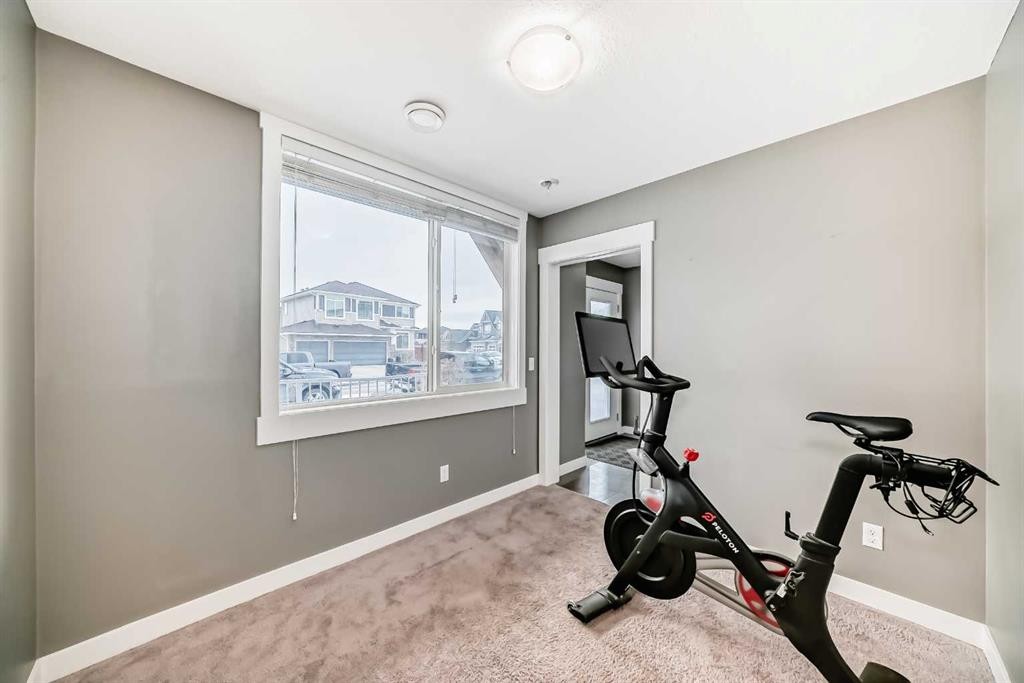 53-111 Rainbow Falls, Chestermere, AB - Indoor Photo Showing Gym Room