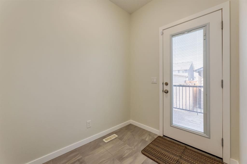 28 Masters Link Se, Calgary, AB - Indoor Photo Showing Other Room