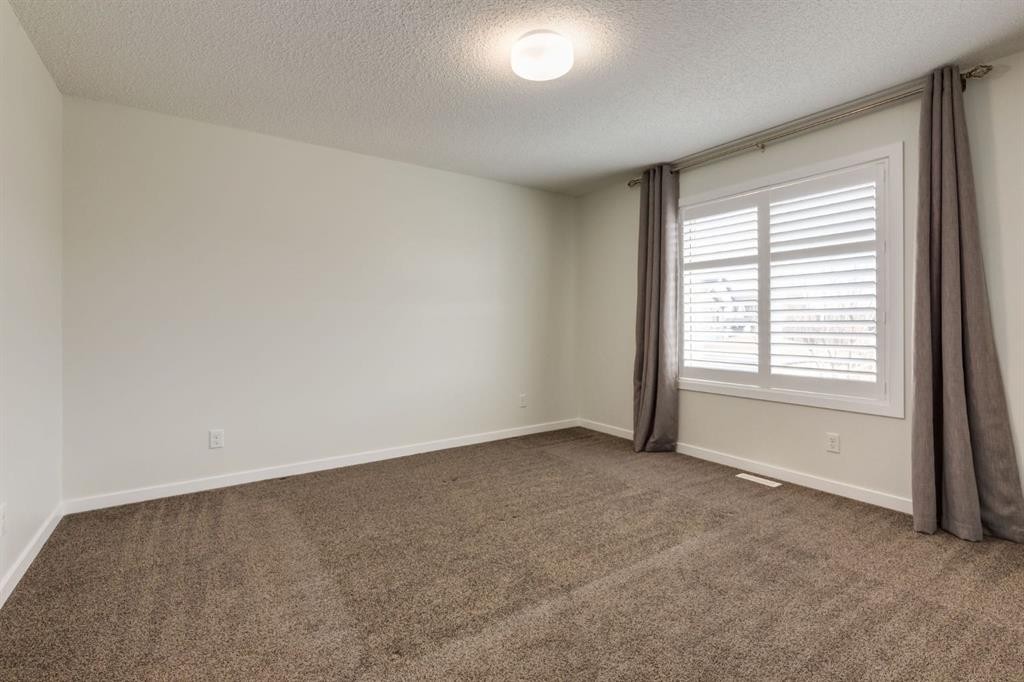 28 Masters Link Se, Calgary, AB - Indoor Photo Showing Other Room