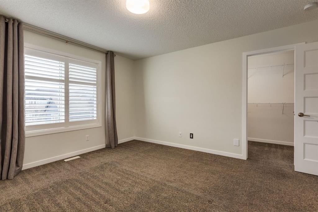 28 Masters Link Se, Calgary, AB - Indoor Photo Showing Other Room