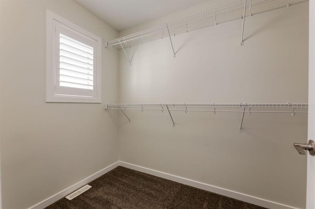 28 Masters Link Se, Calgary, AB - Indoor With Storage