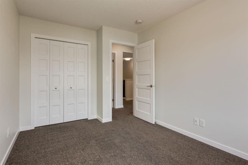 28 Masters Link Se, Calgary, AB - Indoor Photo Showing Other Room