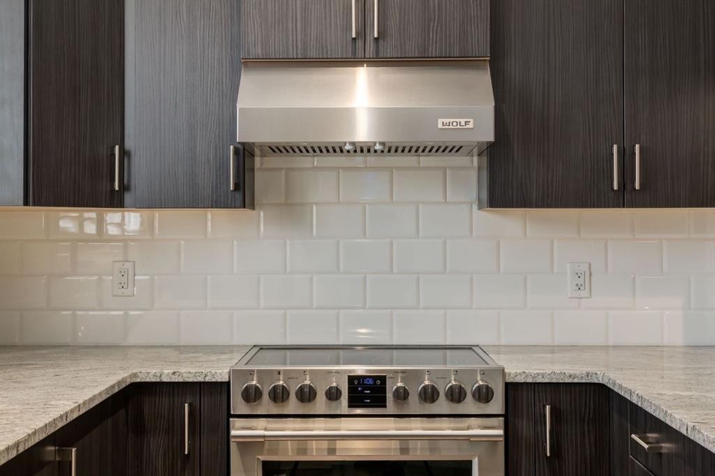 28 Masters Link Se, Calgary, AB - Indoor Photo Showing Kitchen With Stainless Steel Kitchen With Upgraded Kitchen