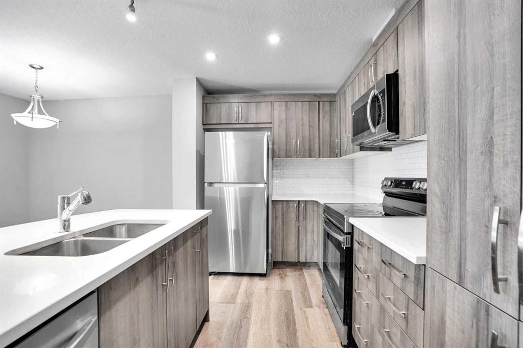 214 Cityside Grove Ne, Calgary, AB - Indoor Photo Showing Kitchen With Double Sink With Upgraded Kitchen