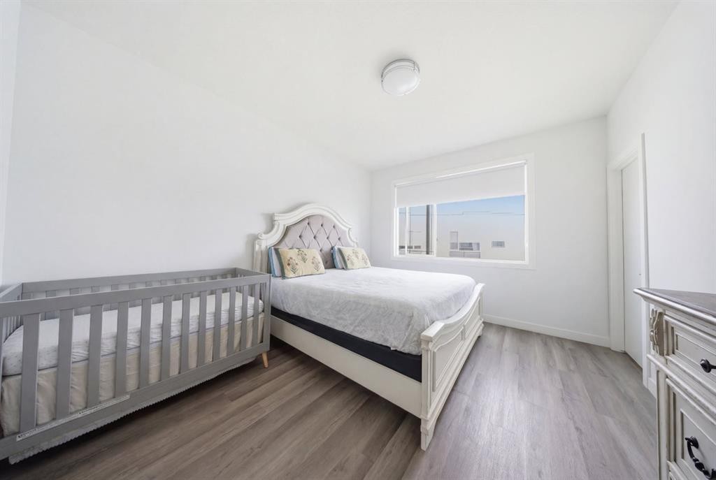 505-101 Panatella Square Nw, Calgary, AB - Indoor Photo Showing Bedroom