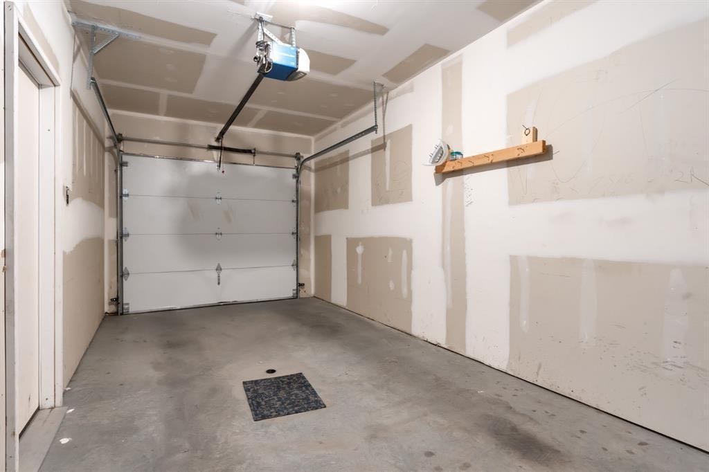 505-101 Panatella Square Nw, Calgary, AB - Indoor Photo Showing Garage