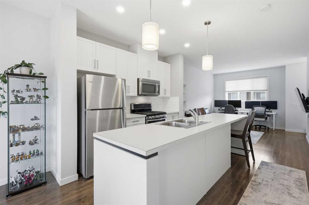 44 Copperstone Common Se, Calgary, AB - Indoor Photo Showing Kitchen With Stainless Steel Kitchen With Double Sink With Upgraded Kitchen
