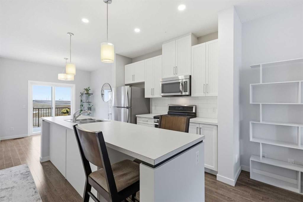 44 Copperstone Common Se, Calgary, AB - Indoor Photo Showing Kitchen With Stainless Steel Kitchen With Double Sink